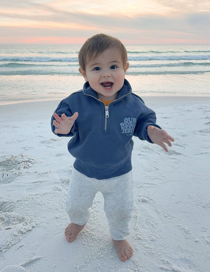 Our World Needs Jesus Kids Half-Zip